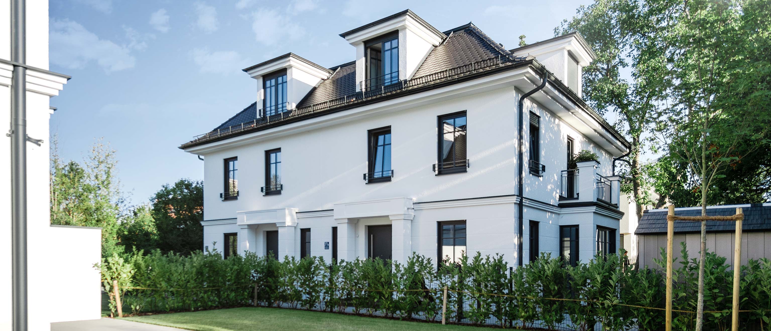 LEAN BAU Referenz | 2 Doppelhäuser mit Duplexgaragen | München